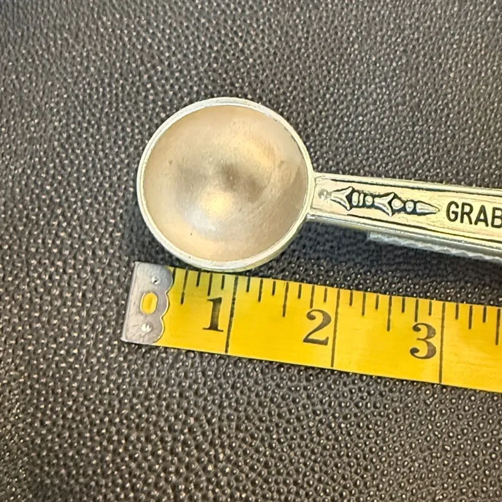 Silver colored Coffee Scoop Clip Grab Life By The Beans